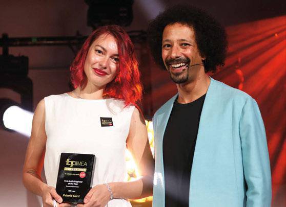 TPiMEA Awards 2023 — Valerie Gard with award on stage